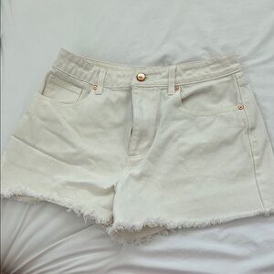 JustFab Cream Jean Shorts with Distressed Hem